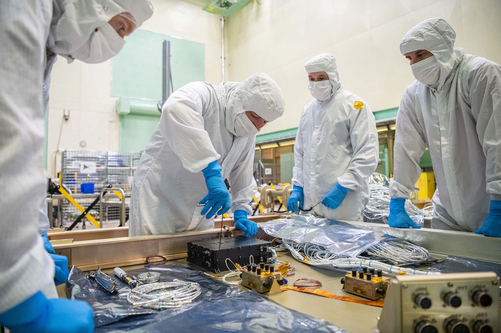 Installing tilt and solar array drive electronics to a PACE spacecraft panel (-Y).
