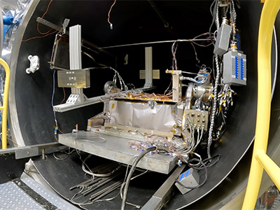 Time-lapse video of PACE Tilt mechanism moving inside the Thermal Vacuum chamber at NASA Goddard Space Center. Credit: Henry, Dennis (Denny)