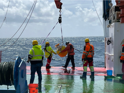 Deployment of a Wirewalker from the RRS <em>James Cook</em>. The wirewalker is an autonomous,  rapid, wave-powered profiling system with bio-optical instruments that provides useful insights about phytoplankton physiology and oceanographic conditions. Credit: Deborah Steinberg