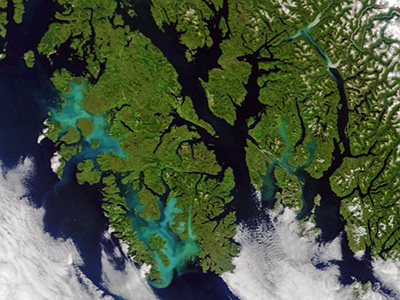 Satellite image of milky blue waters near Prince of Wales Island, AK